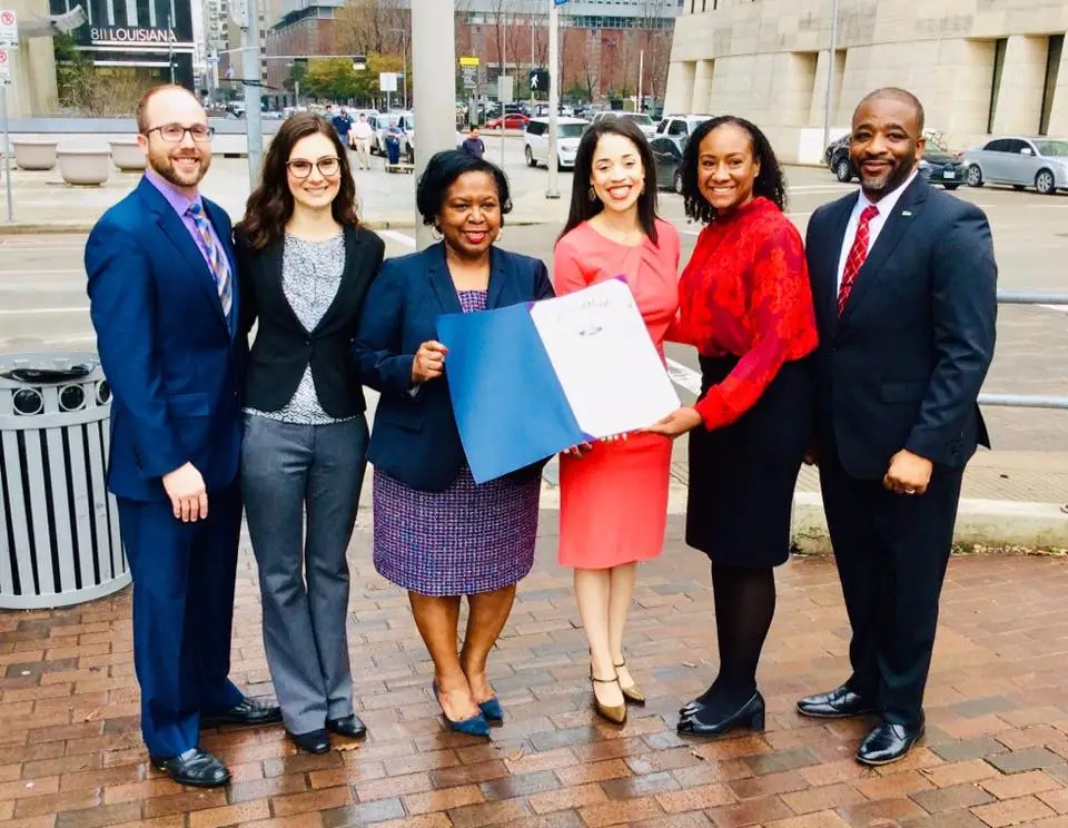 Councilmember Amanda Edwards and City of Houston Press Secretary present the "Transit Equity Day" proclamation to LINK Houston on behalf of Mayor Sylvester Turner.