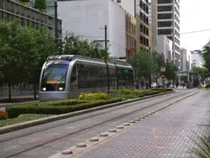 METRO rail passing in Downtown Houston. Image by Streetsblog.