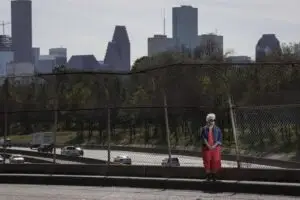 "Susan Graham, co-founder of Stop-TxDOT I-45, poses for a portrait Jan. 27, 2021, on the North Main Street bridge over Interstate 45 in Houston. Jon Shapley, Houston Chronicle / Staff photographer"