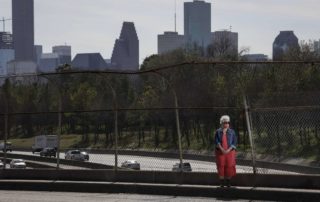 "Susan Graham, co-founder of Stop-TxDOT I-45, poses for a portrait Jan. 27, 2021, on the North Main Street bridge over Interstate 45 in Houston. Jon Shapley, Houston Chronicle / Staff photographer"