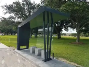 Photo by Gail Delaughter Houston Public Media. "Distinctive bus shelters in the Westchase District were designed to provide better lines of sight for enhanced safety."