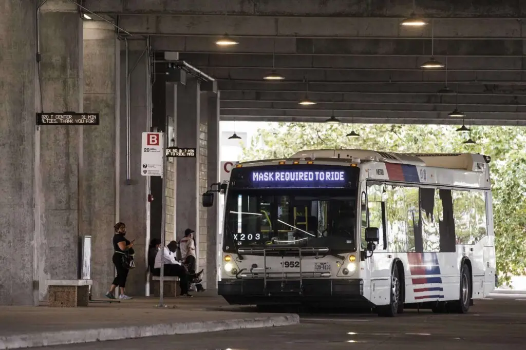 "A Metro Silver Line bus awaits riders at the Westpark/Lower Uptown Transit Center near the Galleria on Aug. 26, 2021 in Houston. Metro ridership dropped sharply during the pandemic, but a new study suggests it was still a vital lifeline for those in critical jobs. Brett Coomer, Houston Chronicle / Staff photographer"