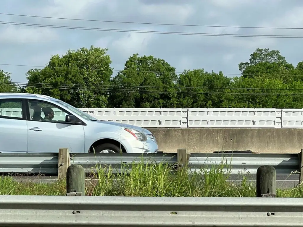 A woman in her car along the "Data shows this stretch of road is one of the deadliest in the city. Jay R. Jordan / Chron staff"