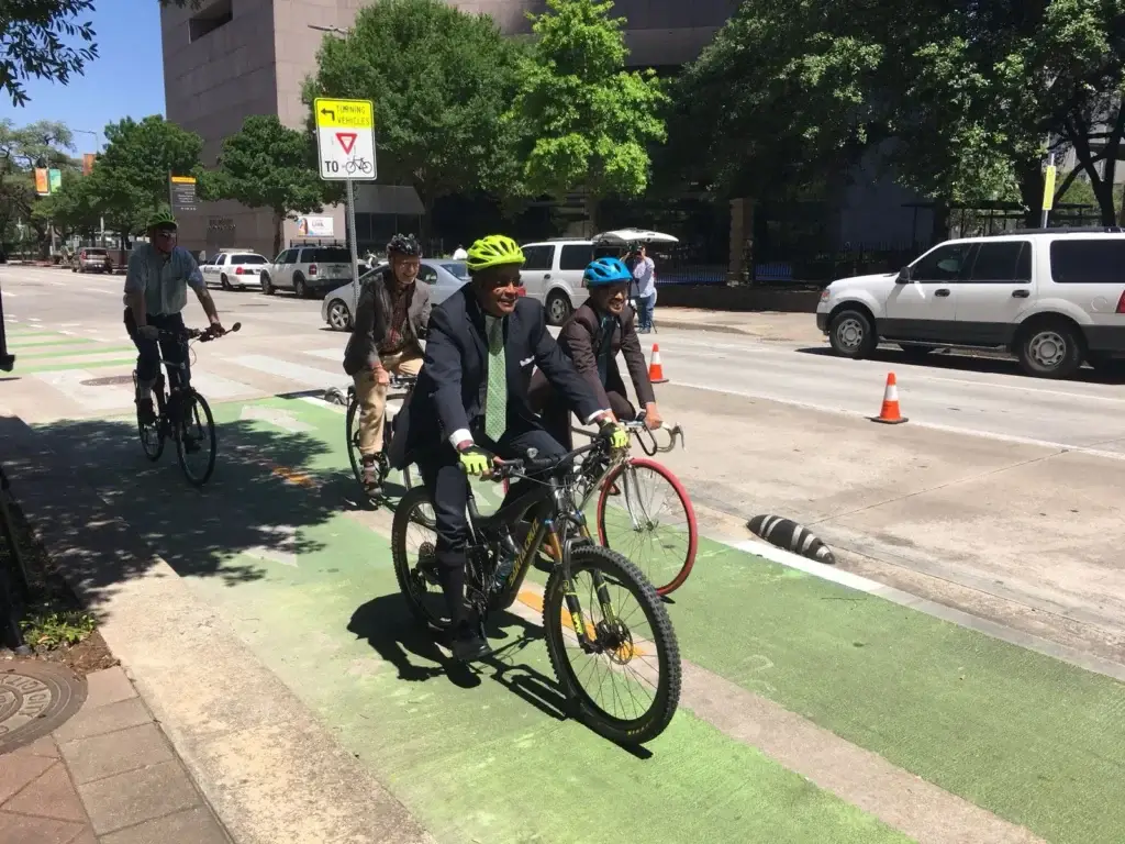 "Harris County Precinct 1 Commissioner Rodney Ellis bikes around the City Hall area in 2018, when he and Houston Mayor Sylvester Turner announced a new partnership between the city and Harris County to create more bike lanes."