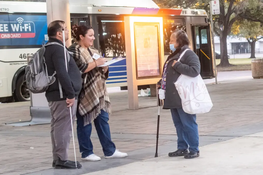 LINK Houston staff canvassing bus riders.